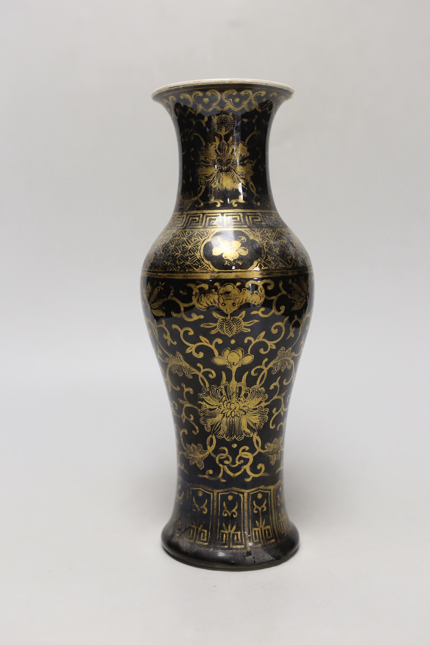 A Chinese gilt decorated mirror black glazed baluster vase, 25.5cm high